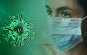 image of covid virus & girl wearing mask